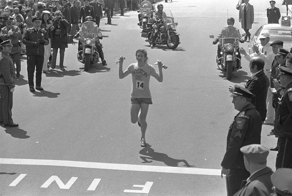 Bill Rodgers crosses the finish line to win the Boston Marathon on April 21, 1975. (AP)