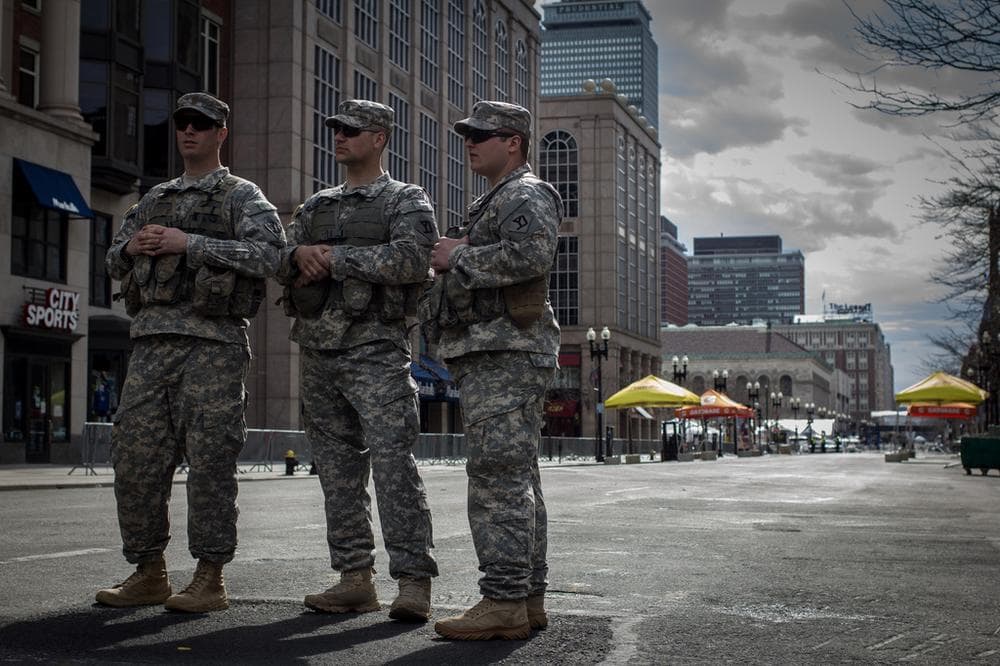 Army National Guardsmen standing at the blockade at Clarendon and Boylston Streets. (Joe Spurr/WBUR)