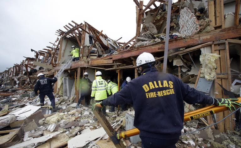 Firefighters conduct search and rescue of an apartment destroyed by an explosion at a fertilizer plant in West, Texas, Thursday, April 18, 2013. (LM Otero/AP)