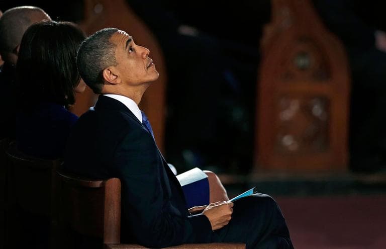 President Obama attends an interfaith healing service at the Cathedral of the Holy Cross in Boston, Thursday for victims of Monday's Boston Marathon explosions. (Charles Krupa/AP)