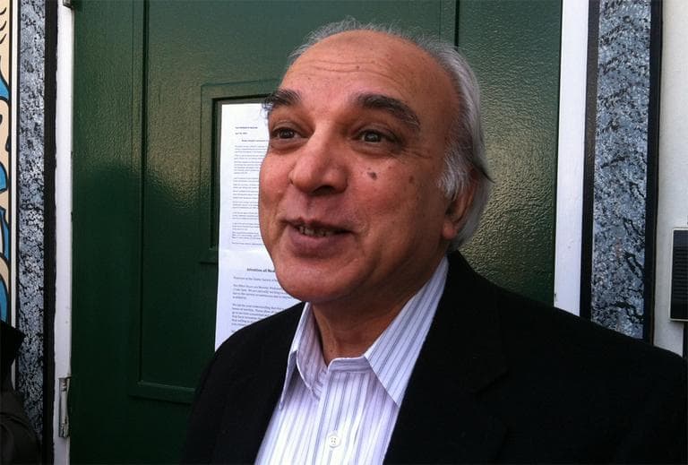 Anwar Kazmi, a member of the executive board of the Islamic Society of Boston, addresses reporters Monday. (Fred Thys/WBUR)