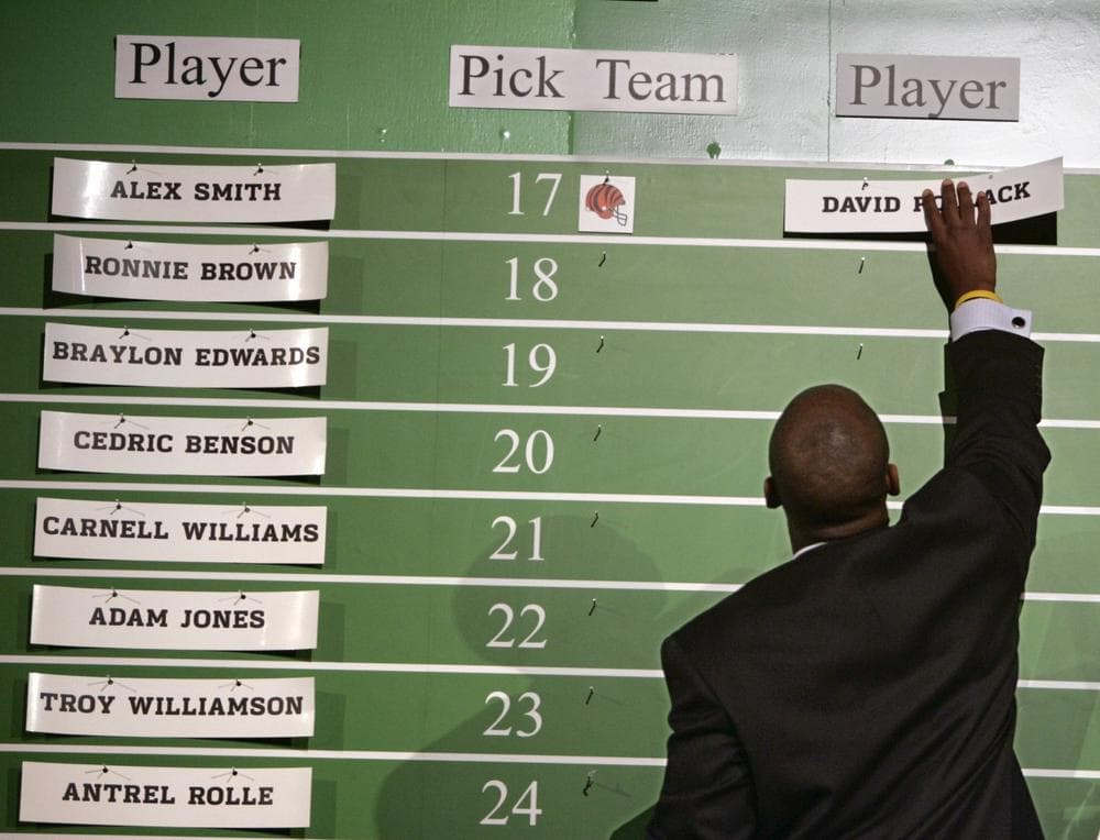 The process NFL teams use to make draft picks is becoming more and more high tech. (Julie Jacobson/AP)