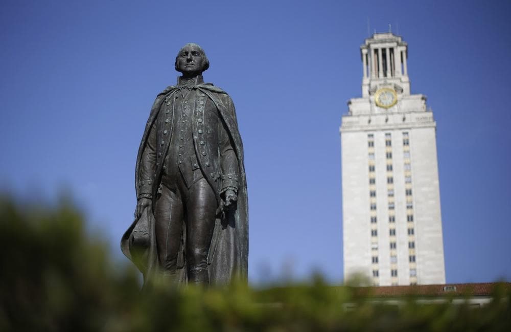 In this Thursday, Nov. 29, 2012 photo, a statue of George Washington stands near the University of Texas Tower at the center of campus, in Austin, Texas. (AP)
