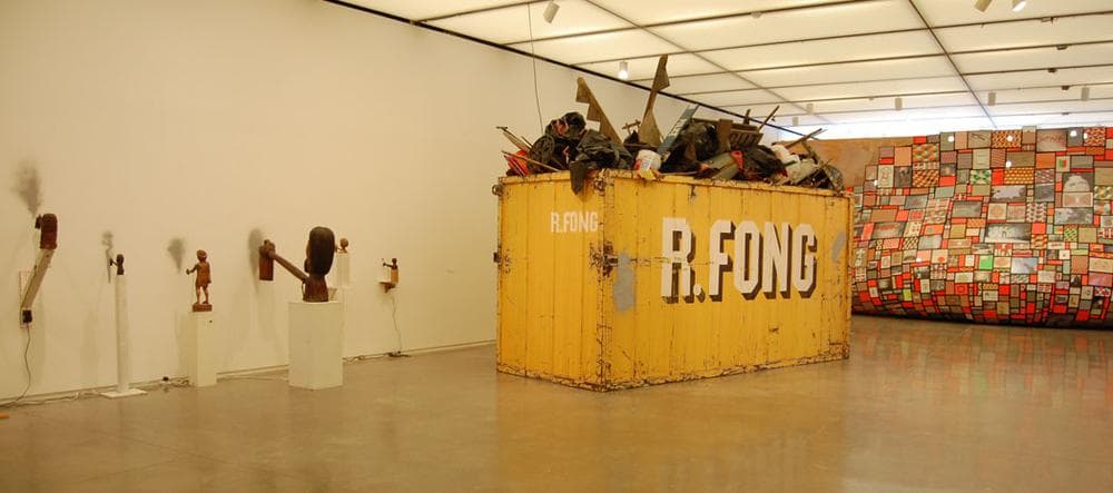 Barry McGee's automated taggers, an R. Fong dumpster (with bathroom hidden inside), and "boil" grouping of photos, drawings and prints. (Greg Cook)