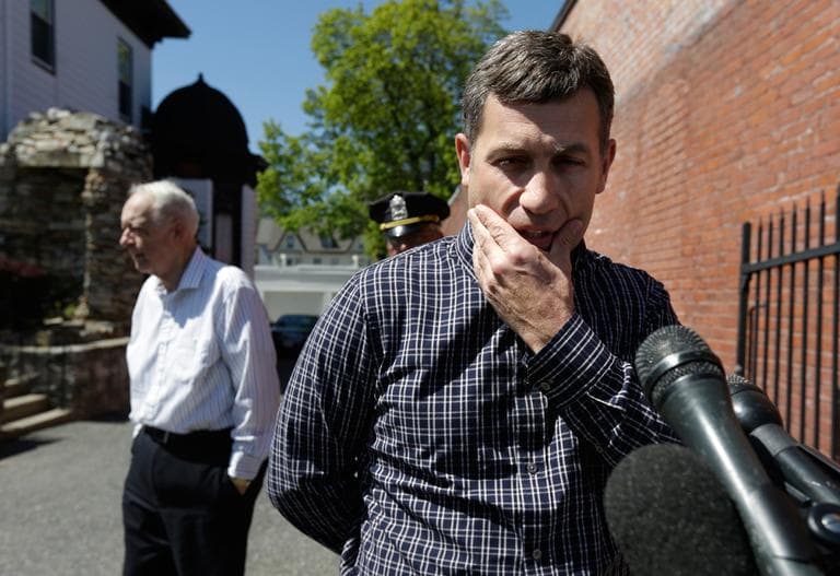 Ruslan Tsarni, right, uncle of killed bombing suspect Tamerlan Tsarnaev, speaks with reporters in front of the Graham Putnam &amp; Mahoney Funeral Parlor in Worcester Sunday, as funeral director and owner Peter Stefan, left, stands nearby. (Steven Senne/AP)