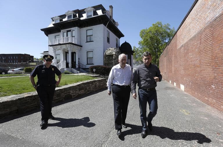 Ruslan Tsarni, right, uncle of killed Boston Marathon bombing suspect Tamerlan Tsarnaev, in front of the Graham, Putnam, and Mahoney Funeral Parlor in Worcester on Sunday. (Steven Senne/AP)