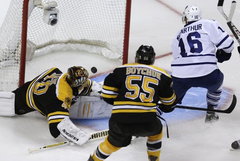 Maple Leafs left wing Clarke MacArthur beats Bruins goalie Tuukka Rask for a goal during Game 5 on Friday. (Charles Krupa/AP)