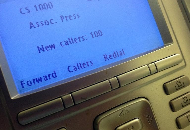 The screen on the phone console at the reception desk at The Associated Press Washington bureau, Monday, May 13, 2013. (Jon Elswick/AP)