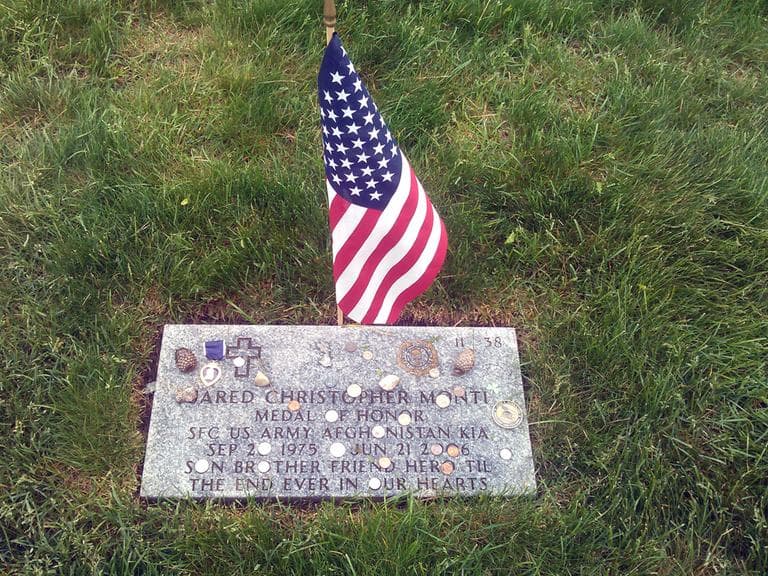 The grave of Jared Monti, who died in Afghanistan in 2006 while he tried to pull a wounded fellow soldier to safety. (Alex Ashlock/WBUR)