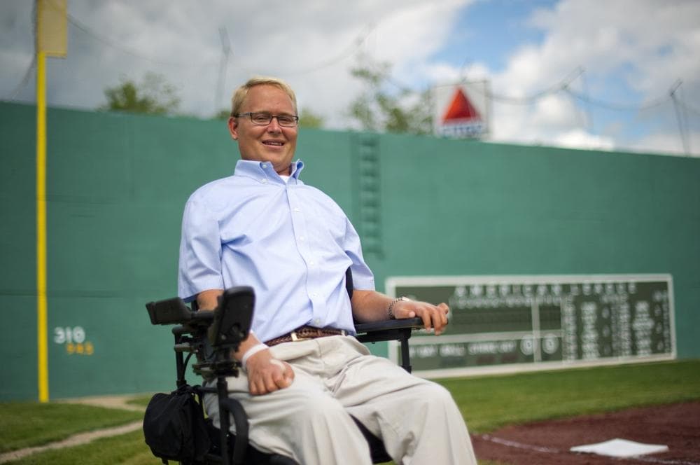 Travis Roy, the namesake of the Travis Roy Foundation, sits by third base at &quot;Little Fenway&quot;, which is modeled after Boston's Fenway Park, before a charity Wiffle Ball tournament to benefit the Foundation in Essex, Vt., on Friday, August 12, 2011. (Andy Duback/AP)