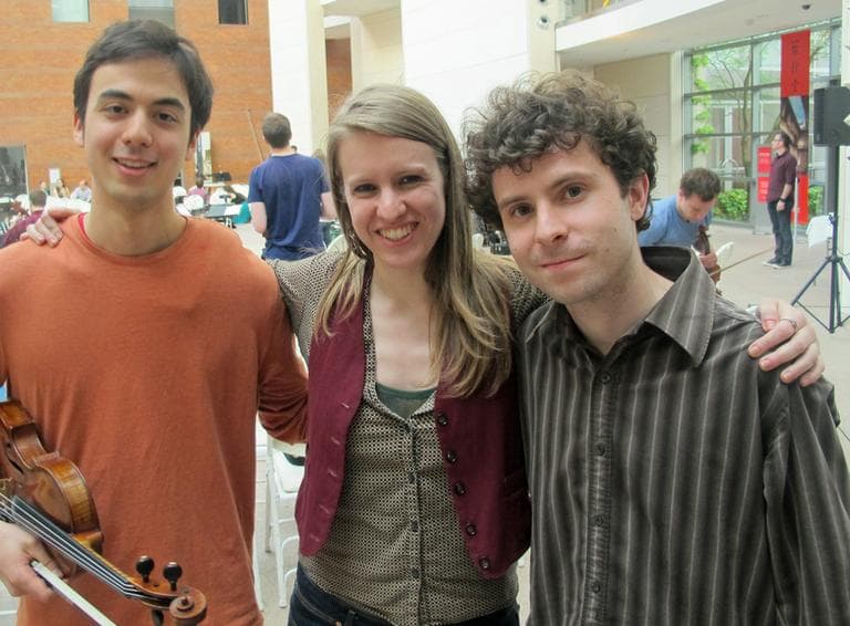 First violinist Keir GoGwilt, left, met Aucoin two years at Harvard. Victoria Crutchfield, center, is directing "Tracing a Line,"  the concert at PEM featuring Aucoin's new work. (Andrea Shea/WBUR)