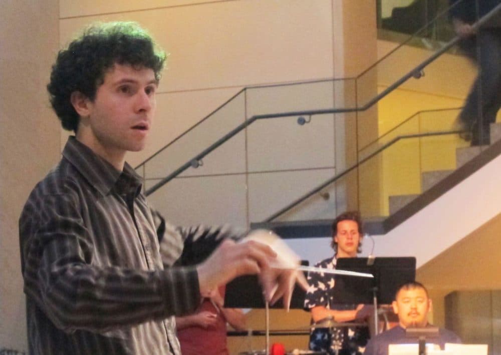 Matt Aucoin rehearses "This Same Light," his first composition as the Peabody Essex Museum's composer-in-residence. (Andrea Shea/WBUR)