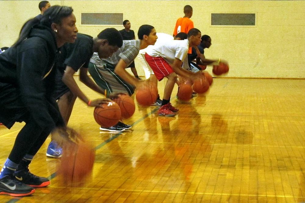 Players dribble during a basketball skills clinic sponsored by the BSA in November. (Karen Given/WBUR)