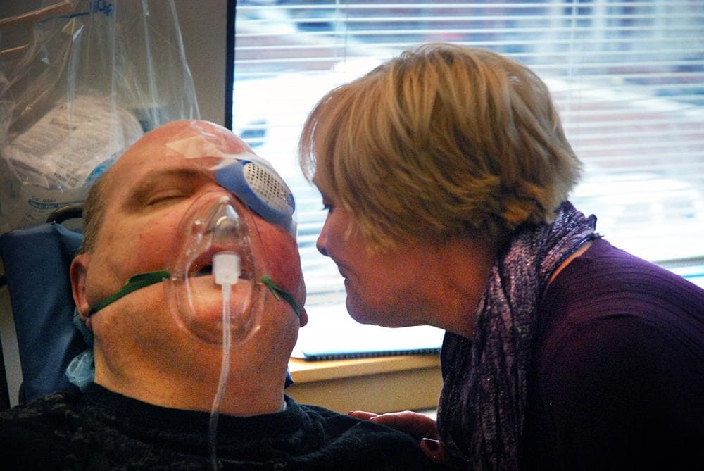 Kevin with his sister and legal guardian Pam Blanchette after surgery. (George Hicks/WBUR)
