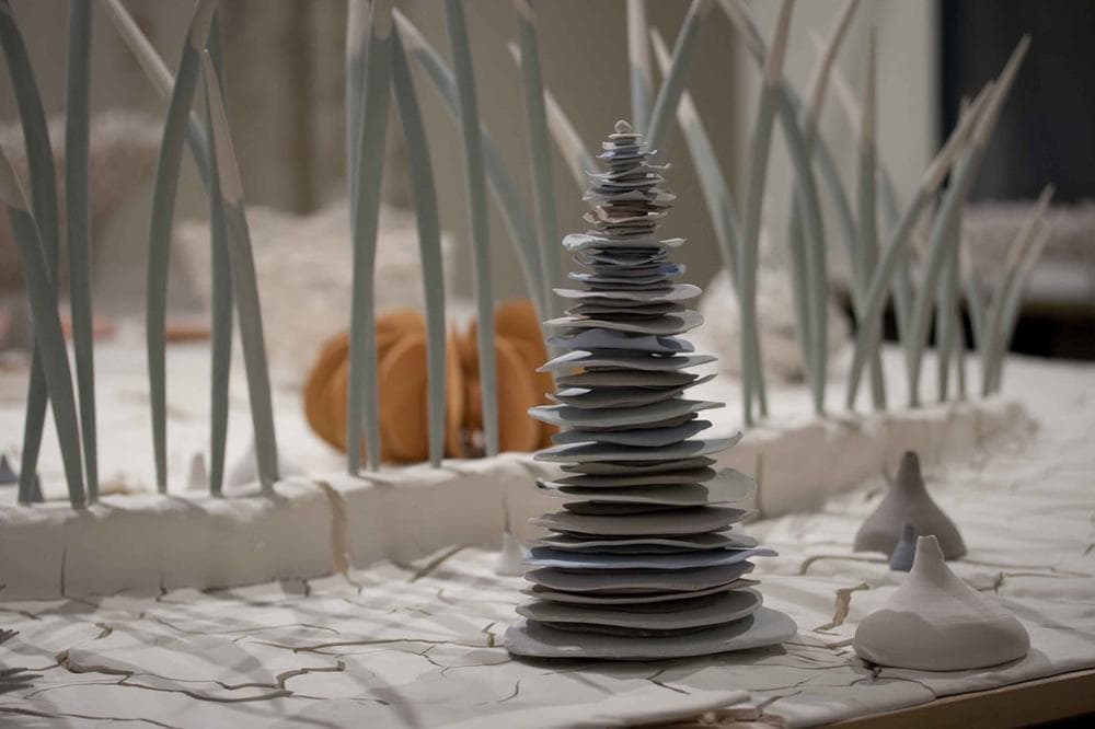 Dorina Molnar's sand-dollar-like “flats” are stacked up into little towers that bring to mind wiggly undersea plants. (Courtesy of the gallery)