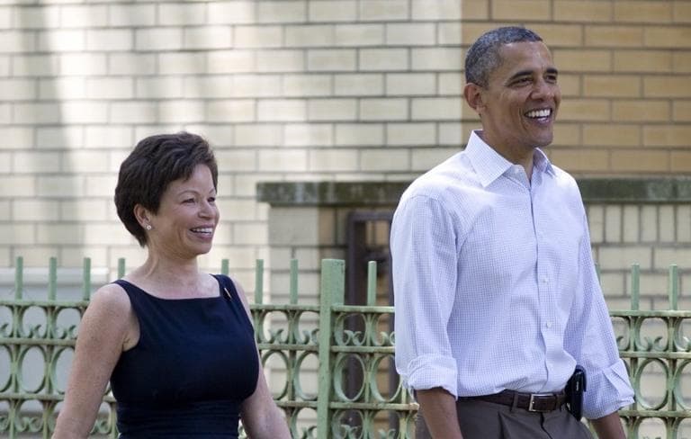 President Barack Obama walks through his Hyde Park neighborhood with senior advisor Valerie Jarrett to Marty Nesbitt's home, Saturday, June 2, 2012, in Chicago. (Carolyn Kaster/AP)