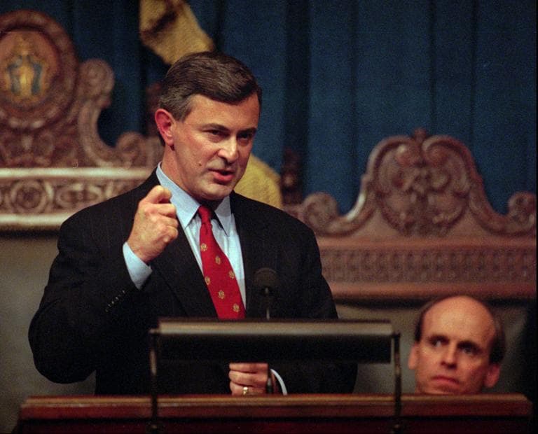 Acting Massachusetts Gov. Paul Cellucci, left, addresses an audience of lawmakers and citizens as House Speaker Thomas Finneran, D-Boston, left, listens Thursday Jan. 15, 1998 at the Statehouse in Boston before Cellucci's "State of the State" address. (William Plowman/AP)
