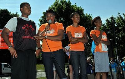 Sherialyn Byrdsong, pictured with her children Ricky Jr.,  Sabrina and Kelley, speaks at the 2012 Race Against Hate. (ywca.org)