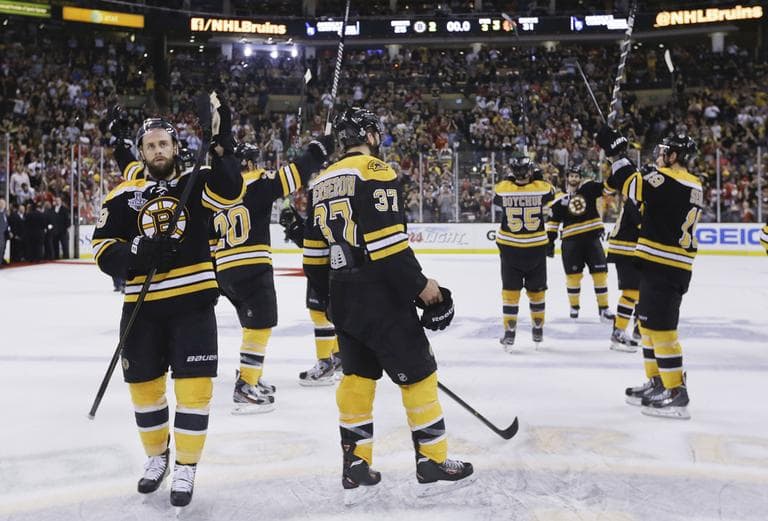 Players acknowledged their fans after the Chicago Blackhawks beat the Bruins 3-2 in Game 6 of the Stanley Cup Finals. (Elise Amendola/AP)