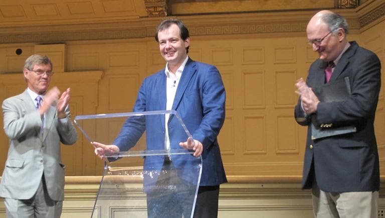 Andris Nelsons, center, with BSO Board Of Trustees Chair Ted Kelly, left, and BSO Managing Director Mark Volpe (Andrea Shea/WBUR)