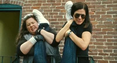 Melissa McCarthy, left, and Sandra Bullock star in the movie "The Heat." (20th Century Fox)