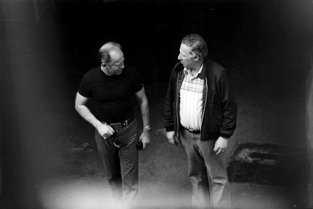 This 1980 surveillance photo shows Bulger, left, with George Kaufman at a Lancaster Street garage in Boston’s North End. (U.S. Attorney’s Office)