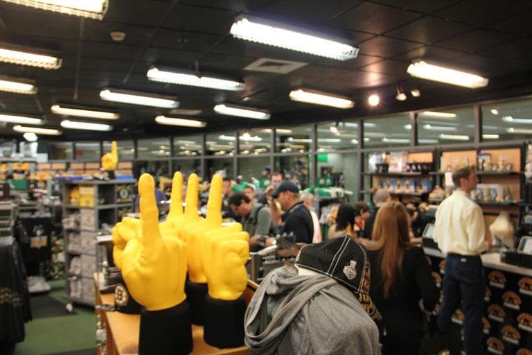 Fans shop for some last minute gear before the game. (Jared Bennett/ WBUR)