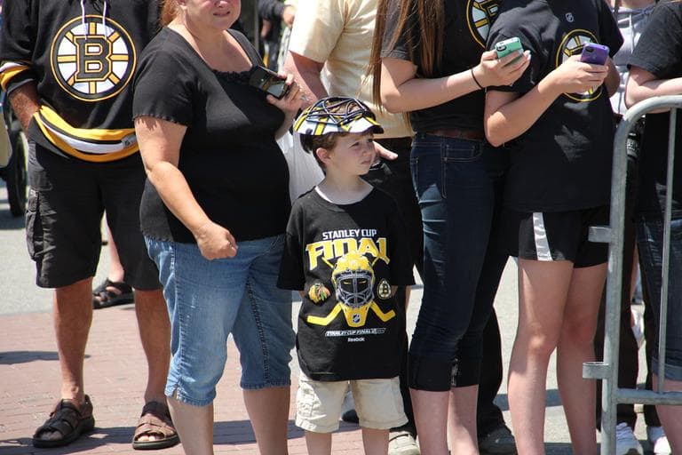 Fans wait for a glimpse of their favorite Bruins players before Wednesday's game.  (Jared Bennett/ WBUR)