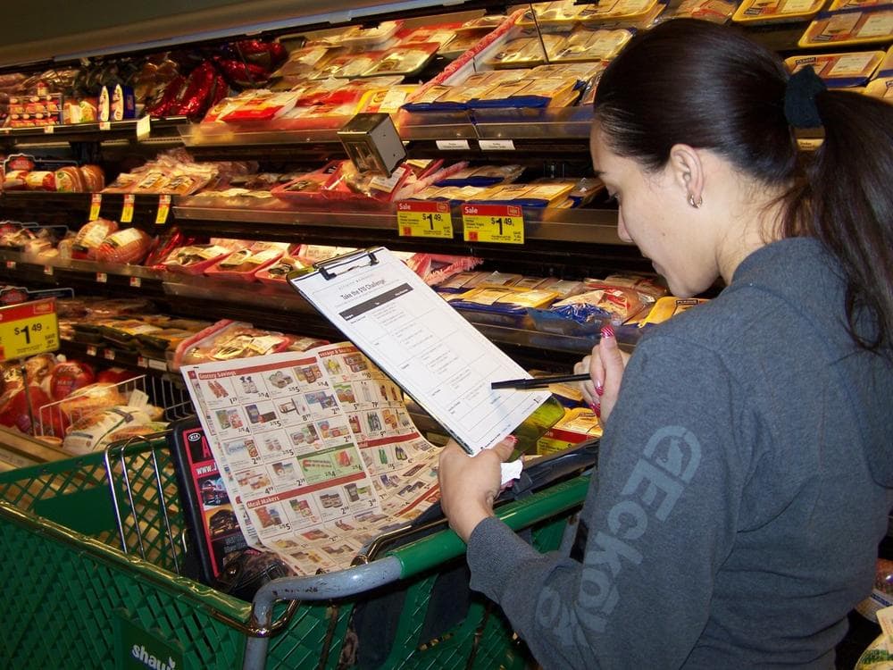  A "Cooking Matters at the Store" participant learns how to maximize their SNAP dollars. (Courtesy Alicia McCabe)
