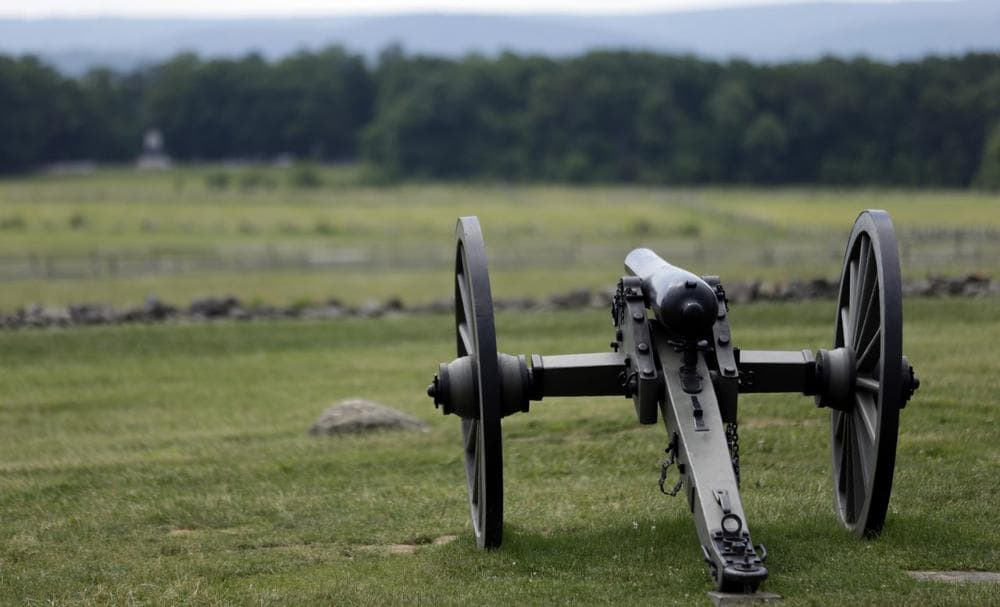 A Union artillery piece sits atop a ridge above the field of Pickett's Charge, Wednesday, June 5, 2013, in Gettysburg, Pa. (Matt Rourke/AP)
