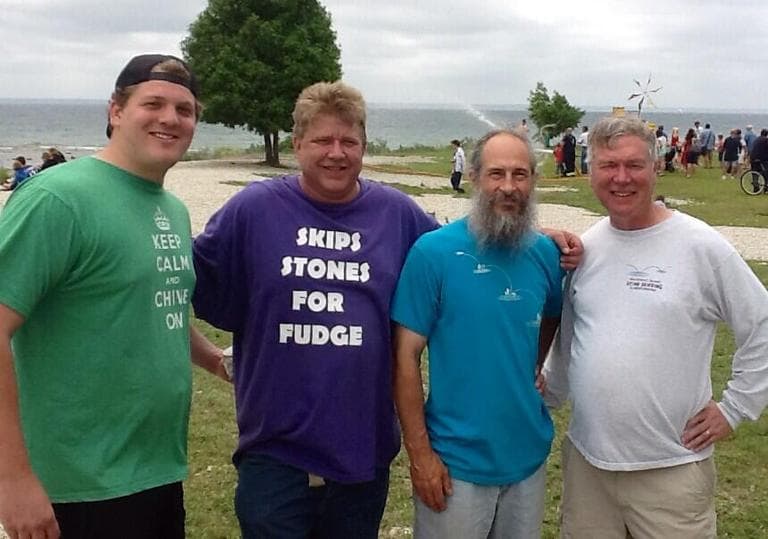Max Steiner, left, won the Mackinac Island Stone Skipping & Gerplunking Club championship with 29 skips. (Courtesy of Eric Steiner)