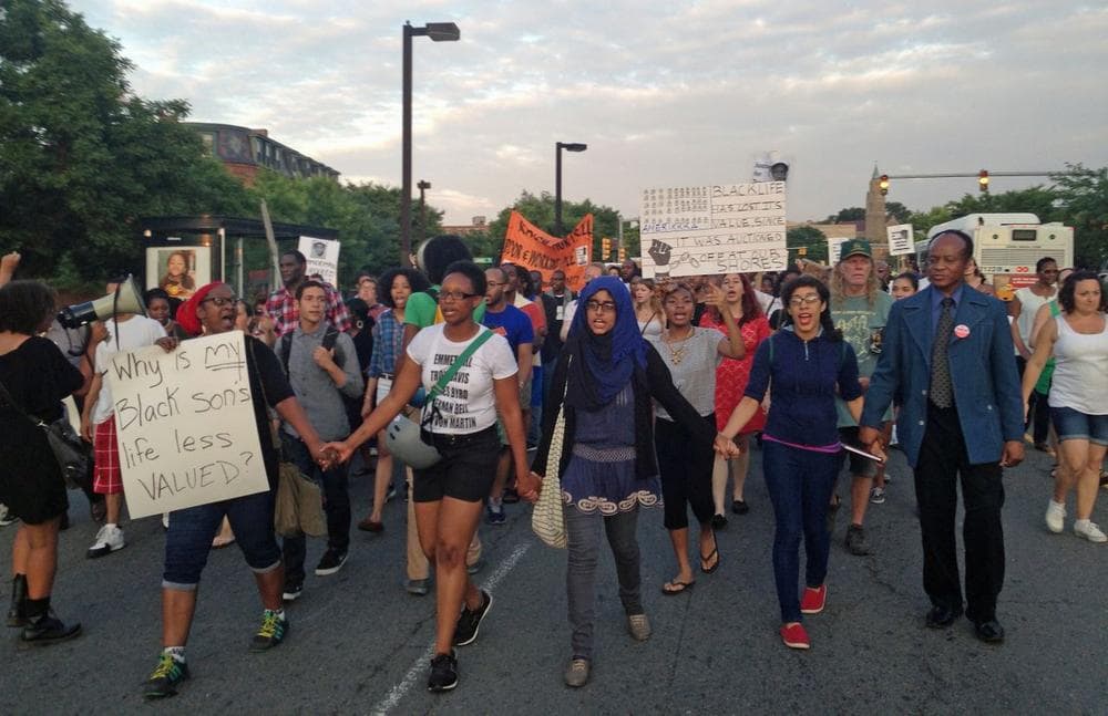 Demonstrators marched from Dudley Square to Ruggles and back in protest of the acquittal of George Zimmerman. (Fred Bever for WBUR)