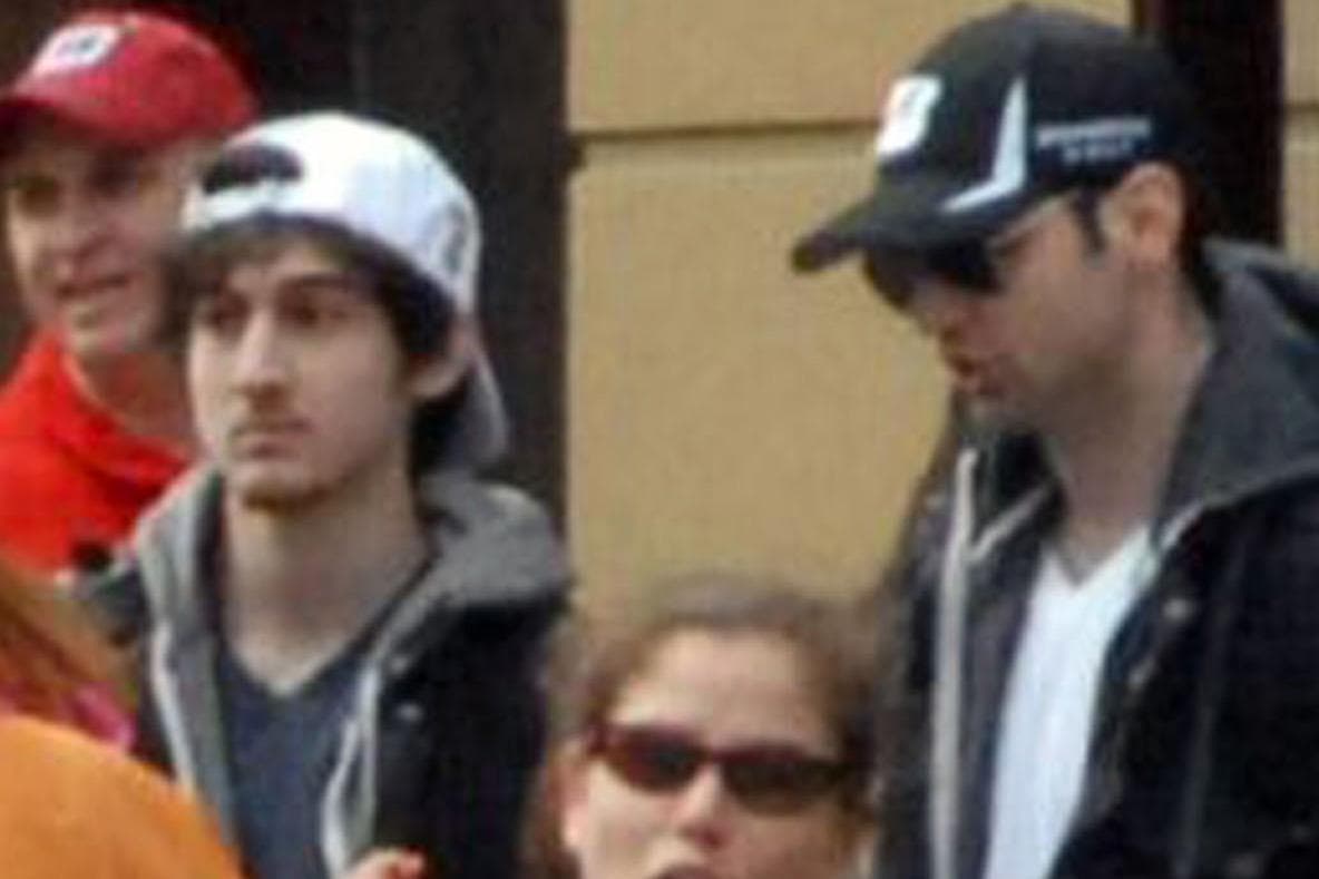 Dzhokhar and Tamerlan Tsarnaev pictured moments before the blasts that struck the Boston Marathon, April 15, 2013. (Bob Leonard/AP) 