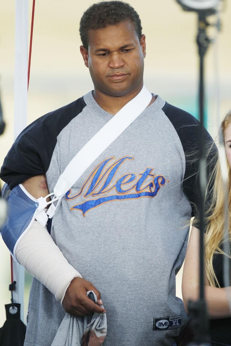 Marcus Weaver, who was injured in the Aurora, Colorado, movie theater shooting, talks to reporters after receiving treatment for his injures, July 20, 2012. (David Zalubowski/AP)