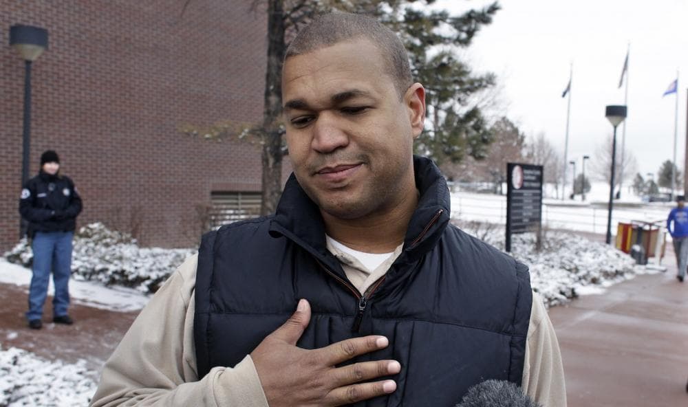 Aurora theater shooting victim Marcus Weaver speaks with members of the media following the arraignment of Aurora shooting suspect James Holmes, at district court in Centennial, Colo., on Tuesday, March 12, 2013. (Brennan Linsley/AP)