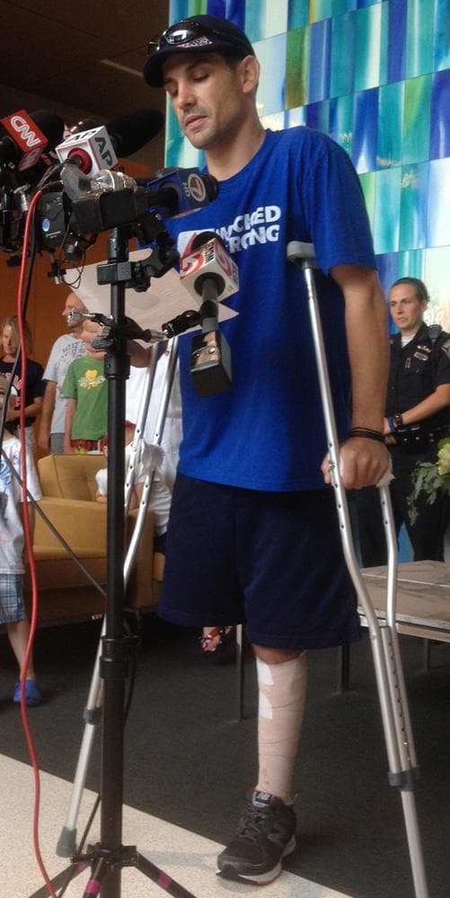 Marathon bombing victim Marc Fucarile speaks before departing Spaulding Rehab Hospital Wednesday. (Martha Bebinger/WBUR)