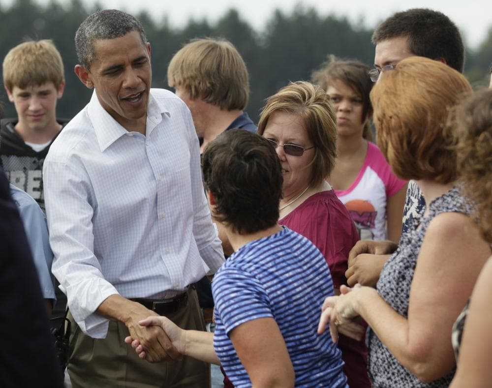 President Barack Obama visits the Galesburg High School football team, Wednesday, Aug. 17, 2011, in Galesburg, Ill., during his three-day economic bus tour. (Carolyn Kaster/AP)
