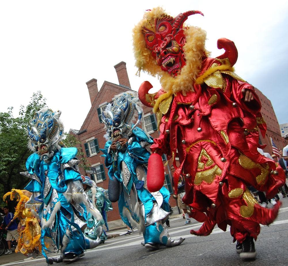 Asociacion Carnavalesca de Massachusetts leads the opening parade of the annual Lowell Folk Festival on July 26. (Greg Cook)
