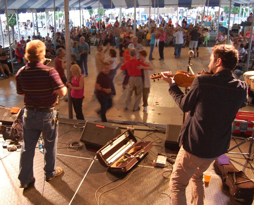 Couples dance in the Dutton Street Pavilion as Jesse Lége and Joel Savoy play Cajun tunes. (Greg Cook)
