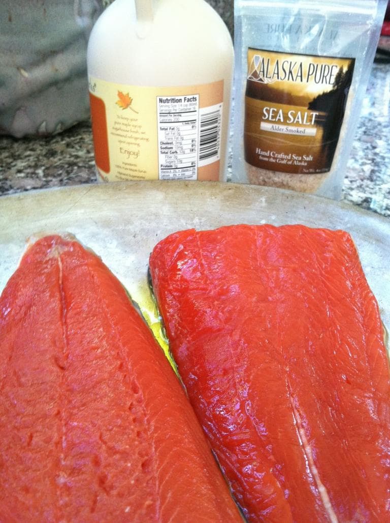 Kathy Gunst prepares her recipe of "Grilled Salmon with Maple Glaze and Sea Salt." (Kathy Gunst/Here &amp; Now)