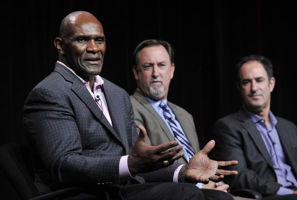 Former New York Giants linebacker Harry Carson, left, and investigative reporters Mark Fainaru-Wada, center, and Steve Fainaru takes part in a panel discussion on the Frontline documentary "League of Denial: The NFL's Concussion Crisis," during the PBS Summer 2013 TCA press tour at the Beverly Hilton Hotel on Tuesday, Aug. 6, 2013 in Beverly Hills, Calif. (Photo by Chris Pizzello/Invision/AP)