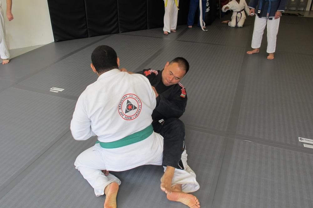 Instructor David Shim spars with a student at the . (Doug Tribou/Only A Game)