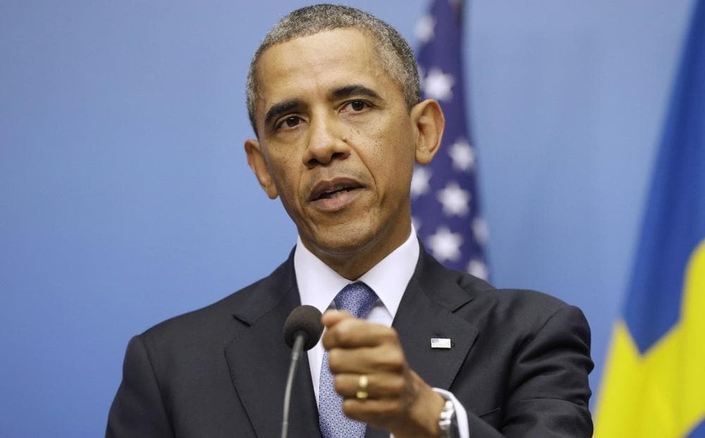 President Barack Obama gestures during his joint news conference with Swedish Prime Minister Fredrik Reinfeldt, Wednesday, Sept. 4, 2013, at the Rosenbad Building in Stockholm, Sweden. (Pablo Martinez Monsivais/AP)