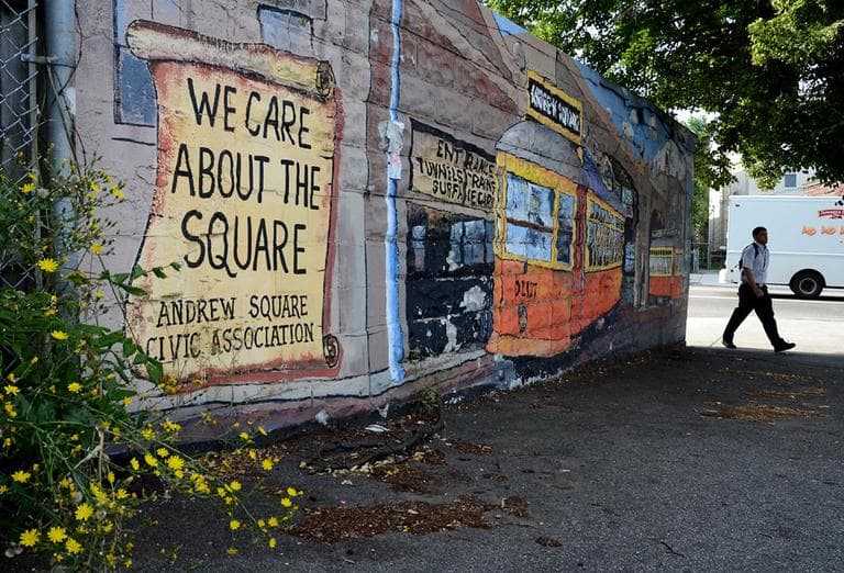 This mural, painted in 2009 by members of the Andrew Square Civic Association, shows the streetcars that used to run through the square. (Robin Lubbock/WBUR)