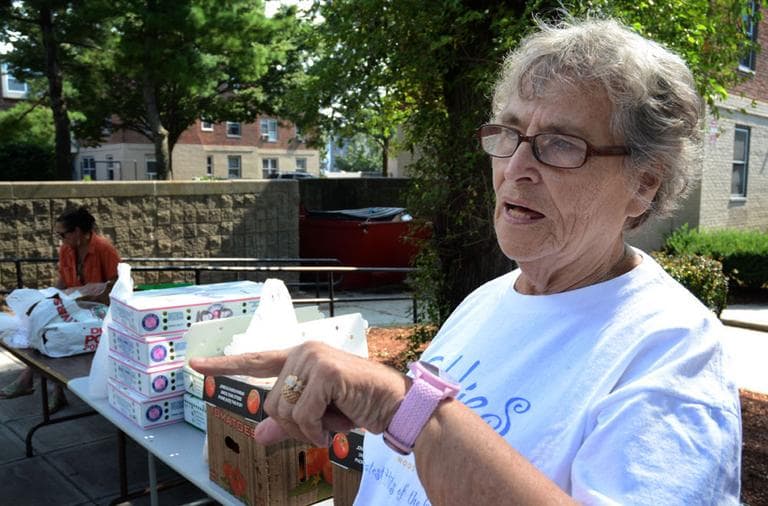 Betty Flaherty, chairperson of the West Broadway Task Force, stands outside the office where she runs meetings on security and events in the housing project. She says the next mayor of Boston should have a strong understanding of all the city’s neighborhoods. (Robin Lubbock/WBUR)