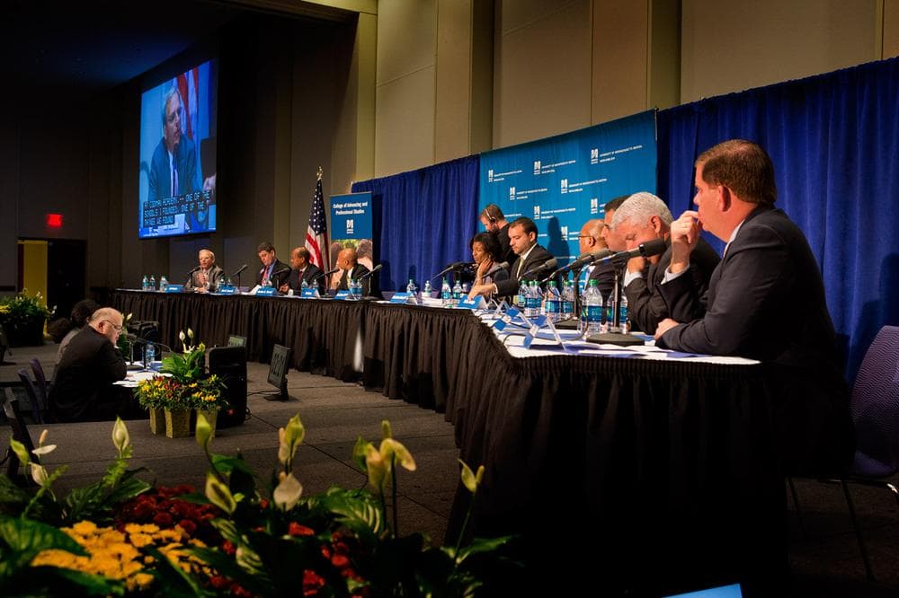 Ten of the 12 Boston mayoral candidates participate in a WBUR/Boston Foundation/UMass Boston forum Thursday night at the school. (Jesse Costa/WBUR)