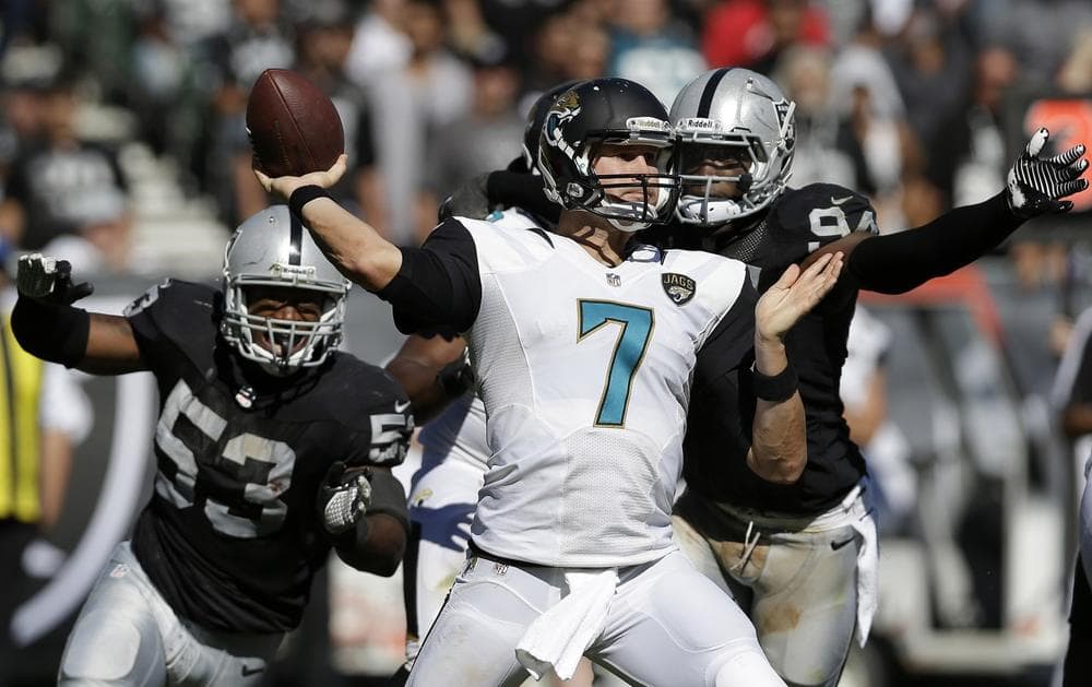 Jacksonville Jaguars quaterback Chad Henne (7) tries to avoid the sack. (Marcio Jose Sanchez/AP)
