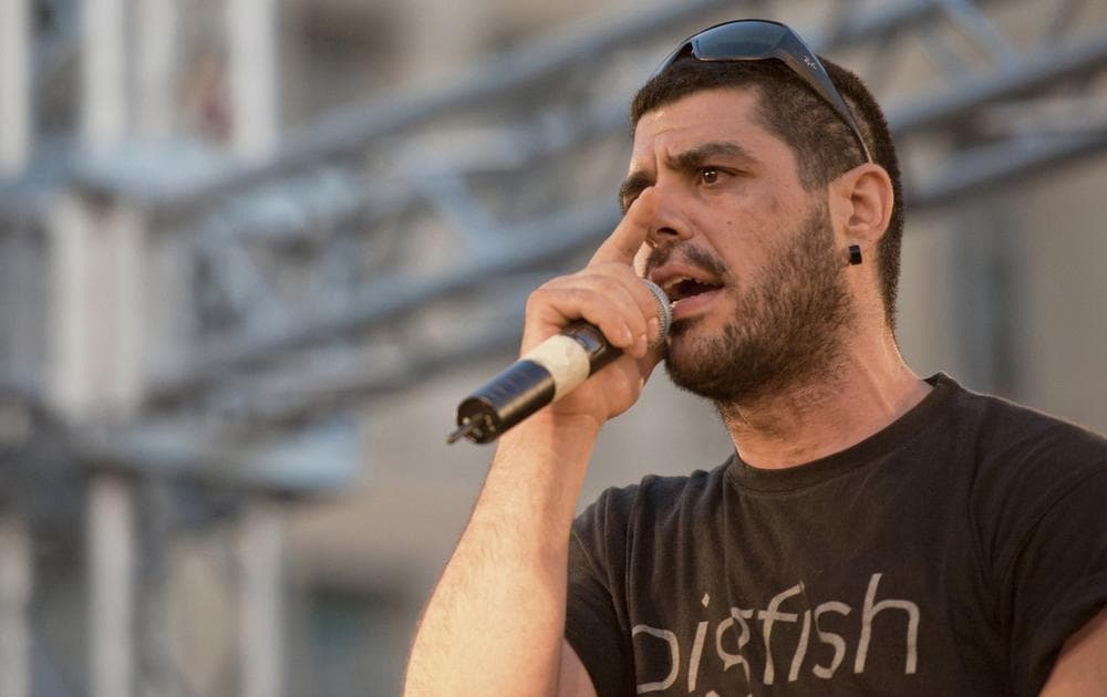 Rapper Pavlos Fyssas, a hip-hop singer with the stage name Killah P, performs on stage in June 2011. (John D. Carnessiotis/AP)