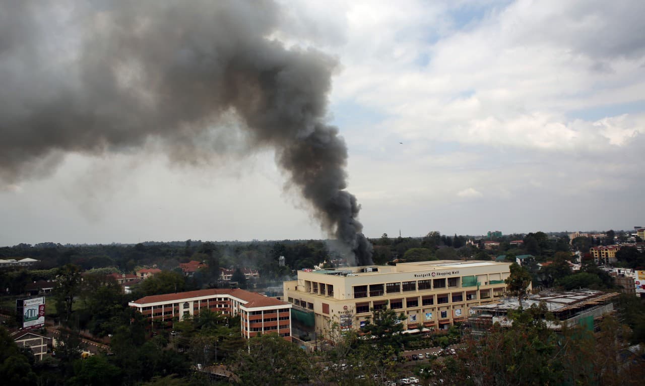 Heavy smoke rises from the Westgate Mall in Nairobi Kenya Monday Sept. 23 2013. (Jerome Delay/AP)