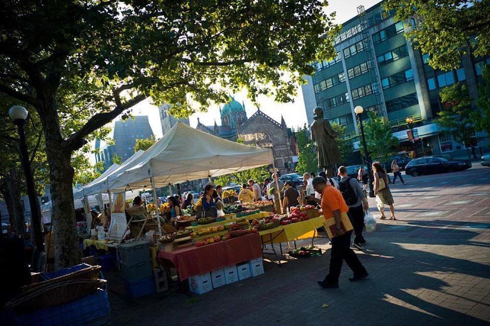 Vendors sell a variety of goods at the twice-weekly farmers market on Copley Square. (Dominick Reuter for WBUR)
